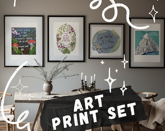 May include: A set of three framed art prints with botanical illustrations and inspirational quotes. The prints are displayed on a wall in a dining room setting with a wooden table and chairs.
