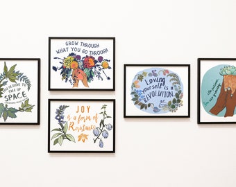 May include: Five framed prints with floral designs and inspirational quotes. The quotes are: "You deserve to take up space", "Grow through what you go through", "Joy is a form of resistance", "Loving yourself is a revolution", and "Be patient, you are growing."
