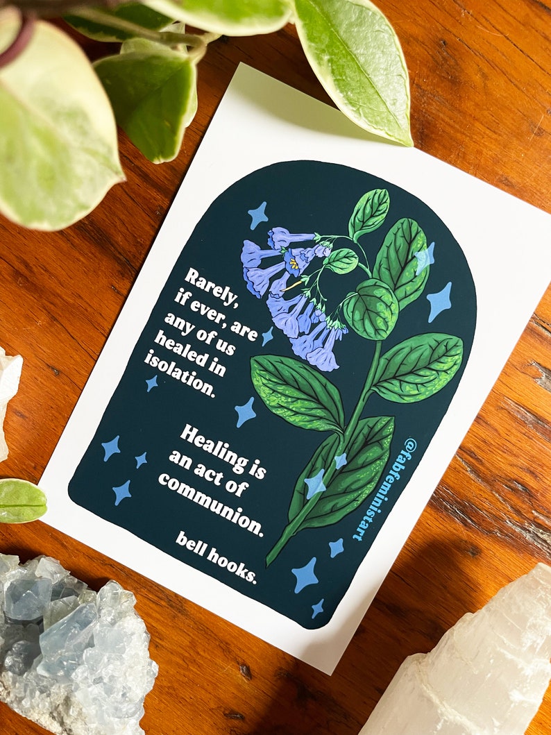 May include: A dark blue and green illustration of a flower with blue blossoms and white stars. The text reads "Rarely, if ever, are any of us healed in isolation. Healing is an act of communion. bell hooks."