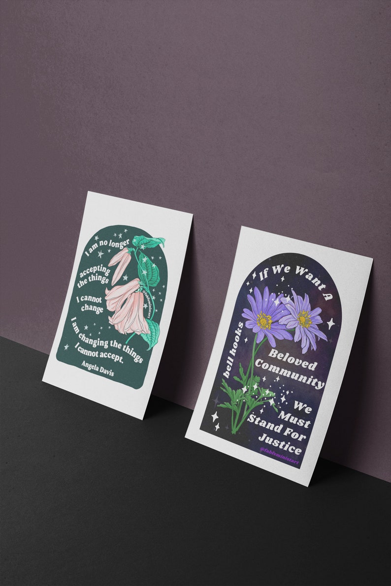 May include: Two printable art prints with inspirational quotes and floral illustrations. The first print features a pink flower with green leaves and the quote "I am no longer accepting the things I cannot change. I am changing the things I cannot accept. - Angela Davis". The second print features a purple flower with green leaves and the quote "If we want a beloved community, we must stand for justice. - bell hooks #prahfeministart".