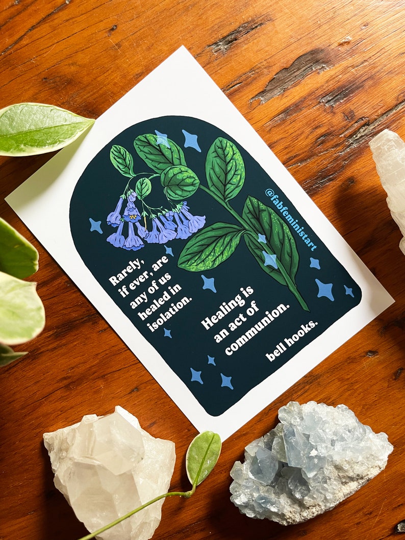 May include: A blue and green illustration of a plant with blue flowers and white stars on a dark blue background. The text reads "Rarely, if ever, are any of us healed in isolation. Healing is an act of communion. bell hooks."