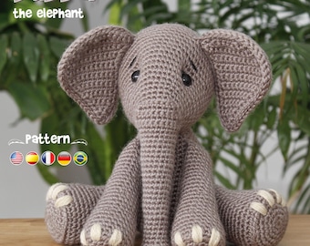 May include: A grey crocheted elephant toy with large ears, a long trunk, and cream-colored stitched toenails. The text "BuBba the elephant" and "Pattern" are visible, along with small flag icons and the brand name "ChiquiPork" at the bottom.
