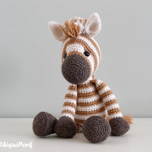 Crochet zebra. Cute amigurumi zebra, White and Brown. Crochet pattern to make your own zebra toy.
