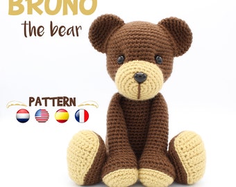 May include: Crochet pattern for Bruno the bear, a brown crocheted teddy bear with beige accents. The pattern is available in English, Dutch, Spanish, French, and German.