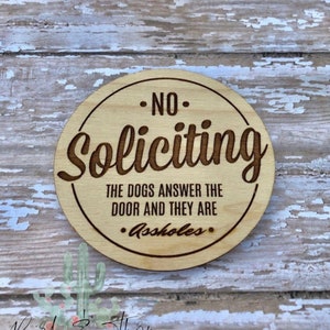 No Soliciting, dogs get angry, dont ring the bell, dogs answer the door image 1