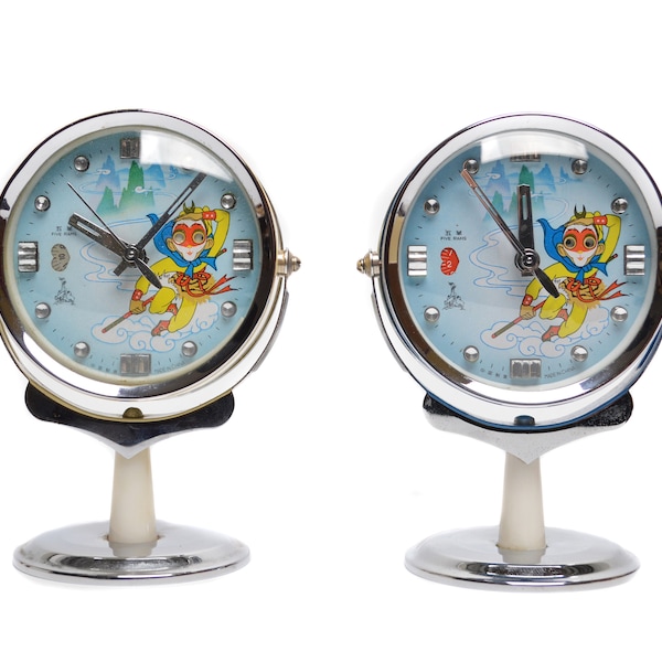 Two 1970's Alarm Clocks 'Moving Eyes' / Five Rams / Sun Wukong / Vintage raised & animated Pedestal Clocks