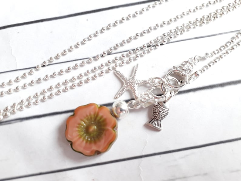 Long begging necklace glass blossom starfish