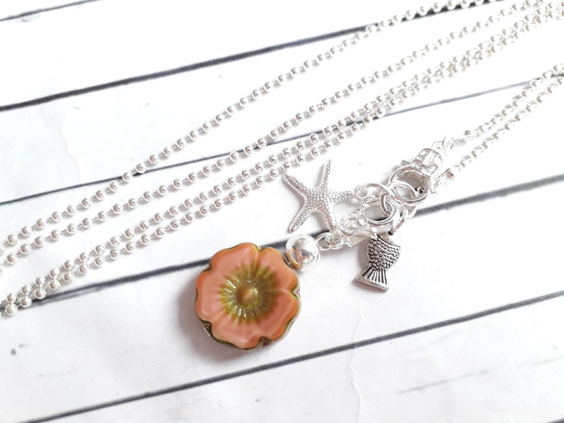 Long begging necklace glass blossom starfish