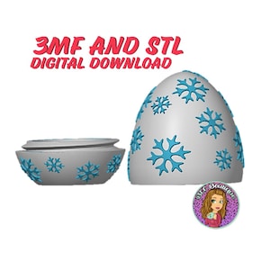 May include: A digital download image featuring a white, egg-shaped object and a bowl, both adorned with blue snowflake designs. The text "3MF AND STL DIGITAL DOWNLOAD" is displayed in red. A logo of a woman is in the bottom right corner.