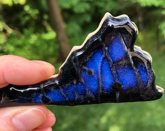 Pottery Virginia Magnet, Black and Blue Color