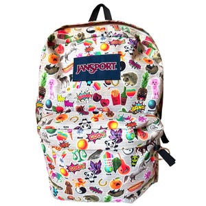May include: A light gray Jansport backpack covered in colorful stickers. The stickers feature various images, including animals, food, and comic book-style exclamations. The backpack has a black handle and straps.