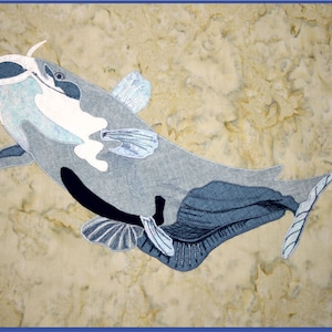 May include: A blue and white illustration of a catfish with a large mouth and a long whisker. The catfish is swimming in a light brown background.