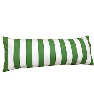 May include: A long, rectangular pillow with a green and white striped pattern. The pillow is made of a soft, comfortable fabric and is perfect for adding a touch of color and style to any room.