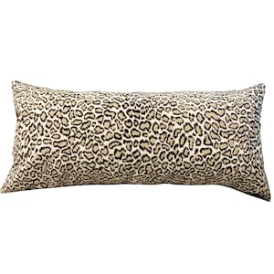 May include: A long, rectangular cushion with a brown and beige leopard print pattern.