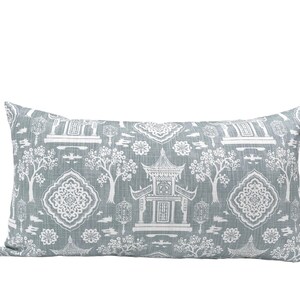 May include: A gray rectangular pillow with a white pattern of pagodas, trees, and geometric designs.