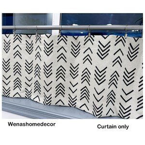 May include: A beige curtain with a repeating black chevron pattern. The curtain is hanging from a silver rod with metal clips. The text "Wenashomedecor" and "Curtain only" are visible at the bottom of the image.