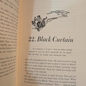 An open book page with text and an illustration. The illustration depicts a person on a horse. The text reads "22. Black Curtain". The page has a cream-colored background.