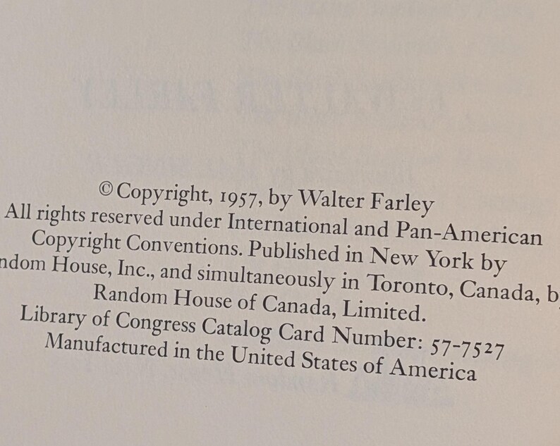 Publication page showing a book's copyright page, including the copyright symbol, the year 1957, and the author's name, Walter Farley. The text also mentions the publisher, Random House, and the Library of Congress Catalog Card Number.
