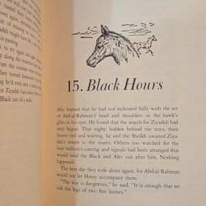 An open book page with text and a black and white illustration of a horse's head and a running horse. The text reads "15. Black Hours". The page has a cream-colored background.