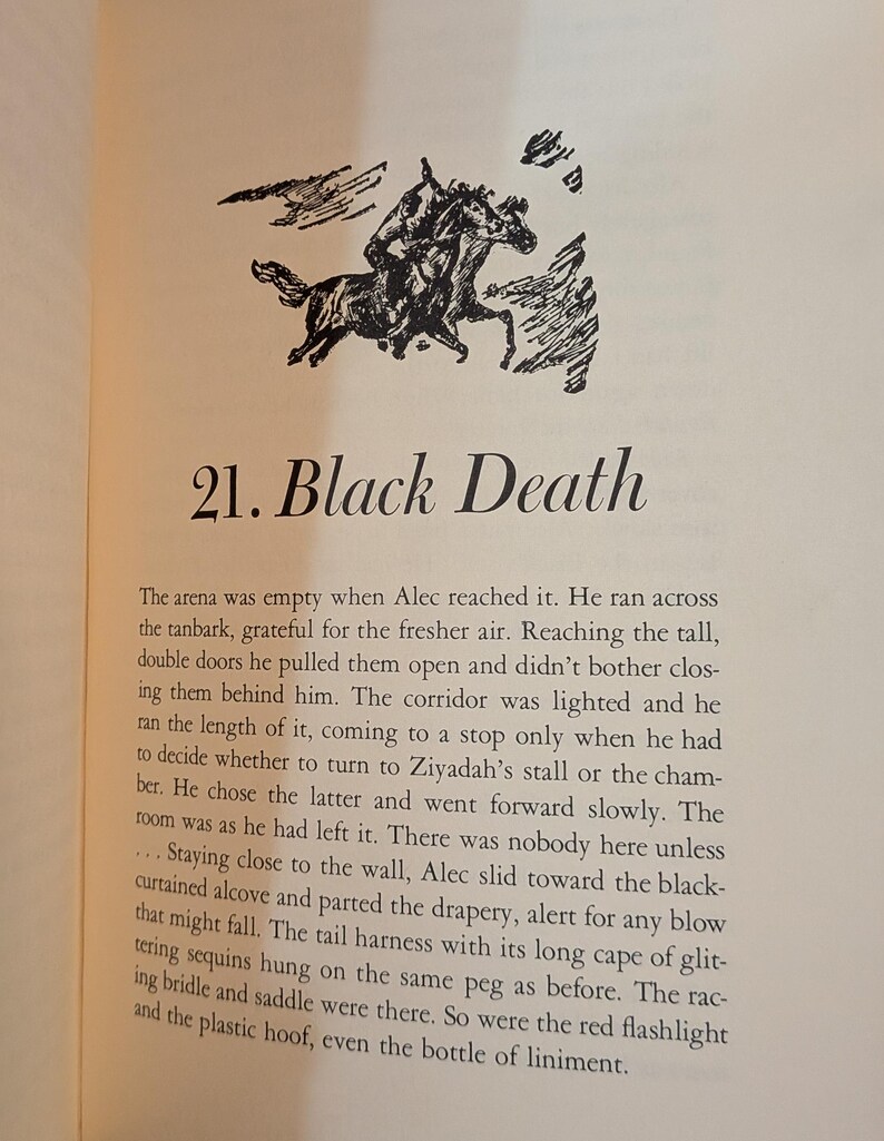 An illustration from a book page depicts two horses with riders in a dynamic, black and white sketch. The text "21. Black Death" is prominently displayed below the illustration, with accompanying descriptive text.
