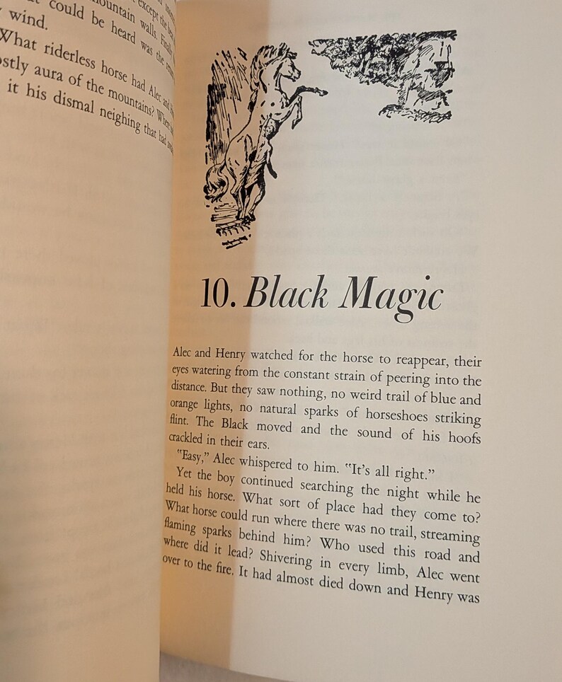 a page from a book titled 10. BLACK MAGIC. there is a black ink drawing of a horse rearing up