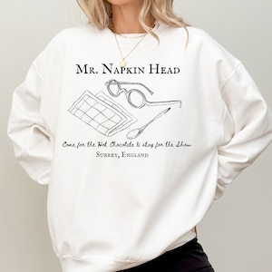 The Holiday Movie Merch Mr. Napkin Head Nancy Meyers Rosehill Cottage Amanda Woods The Holiday Season RomCom Surrey Sweatshirt Hoodie Shirt