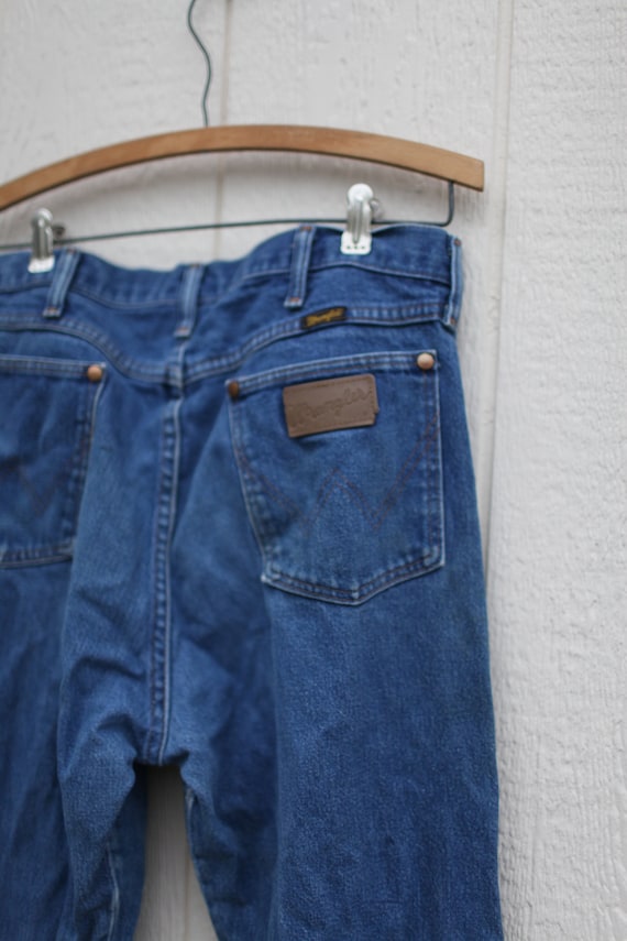 vintage distressed wrangler 1980's blue jeans denim… - Gem
