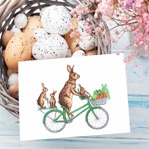 Famille de lapins à vélo, carte de voeux