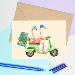 Flamant rose en scooter, carte de souhaits