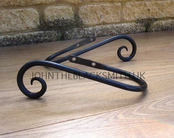A Pair of Blacksmith Wrought Iron Handmade Forged Curtain and Drapes Hold Backs with a scrolled end, forged in the UK