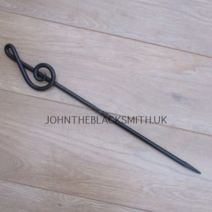 A Blacksmith Hand Forged Musical Treble Clef Fire Poker tool, Hand forged in the U.K