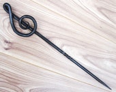 A Blacksmith Hand Forged Musical Treble Clef Fire Poker tool, Hand forged in the U.K