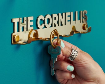 Gepersonaliseerde massief messing sleutelhanger familienaam, cadeau nieuw huis