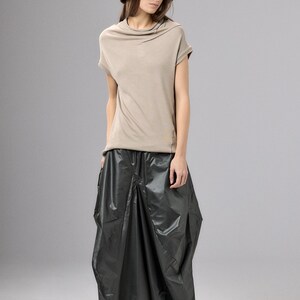 May include: A rustic wooden sign with the text "Welcome to our home" in a handwritten style. The sign features a distressed finish and a simple, inviting design, perfect for a front porch or entryway.