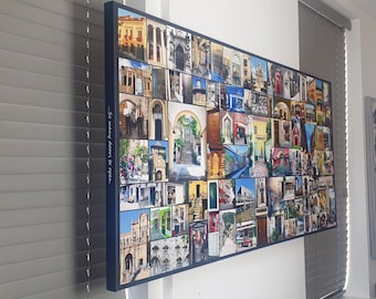 May include: A large rectangular wall art piece featuring a collage of colorful door images. The artwork is framed in a dark blue border and includes the text "...So many doors to open." The images showcase various architectural styles.