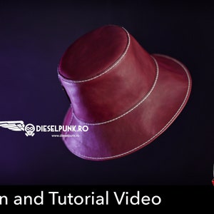 May include: A burgundy leather bucket hat with white stitching. The hat is floating in the air against a purple background. The text "Pattern and Tutorial Video" is at the bottom of the image.