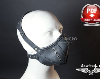 May include: A black leather face mask with a strap that goes around the head. The mask has a stitched design and multiple metal rivets. The mask is on a white mannequin head.