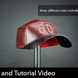 May include: A dark brown leather baseball cap with red stitching and the number 60 appliqued on the front. The text three different sizes included from XS to XL and Pattern and Tutorial Video are visible. A red PDF download icon is in the corner.