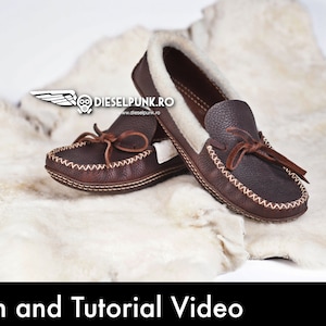 May include: A pair of brown leather moccasins with a white fur lining. The moccasins have a decorative stitching detail around the edges and a bow on the top. The moccasins are sitting on a white fur rug.