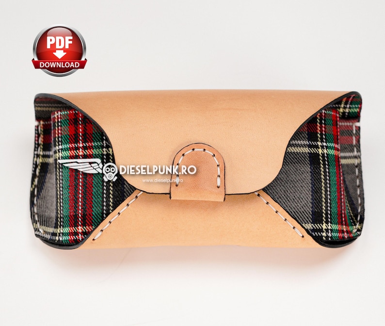 May include: A brown leather glasses case with a plaid fabric lining. The case has a stitched seam and the text "DIESELPUNK.RO" is printed on the front.