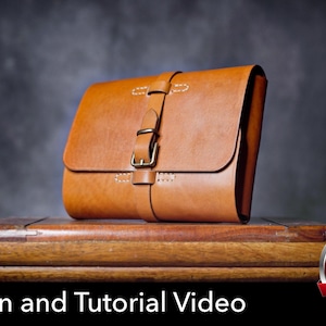 May include: A tan leather satchel with a single front flap, a vertical strap, and a metal buckle closure. The bag features visible light-colored stitching along the edges and the strap. Text at the bottom reads Pattern and Tutorial Video.