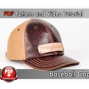 May include: A brown leather baseball cap with a tan mesh panel and a brown leather patch with the text "DIESELPUNK" and a winged skull logo. The cap has a brown stitched brim.