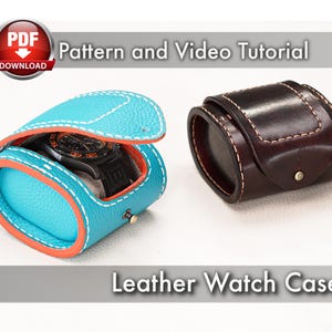 May include: Two leather watch cases. One is turquoise with orange trim and white stitching, open to reveal a black watch. The other is dark brown with white stitching and a snap closure. Text reads "Pattern and Video Tutorial" and "Leather Watch Case."