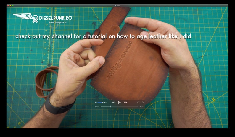 May include: A close-up of a brown leather pouch with a logo and the text "DIESELPUNK.RO". The text "check out my channel for a tutorial on how to age leather like I did" is also visible. The pouch is being held.