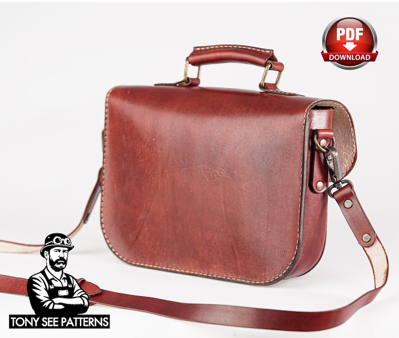 May include: A reddish-brown leather satchel with a top handle and a long, adjustable shoulder strap. The bag has a rectangular shape with rounded edges and a metal clasp. The image includes a "PDF Download" badge and the text "TONY SEE PATTERNS".