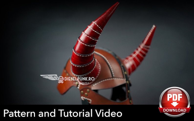 May include: A brown leather helmet with two red horns. The horns are made of multiple layers of leather stitched together. The helmet has a stitched design and metal accents. The text "Pattern and Tutorial Video" is at the bottom of the image. A red button with the text "PDF DOWNLOAD" is in the lower right corner.
