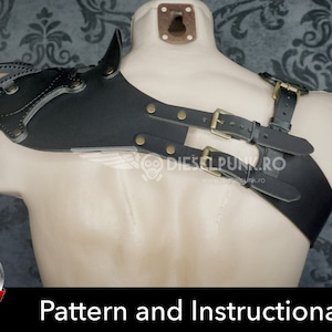 May include: Black leather shoulder armor with a wing design and straps. The armor is on a mannequin. The image includes the text "Pattern and Instructional Video" and a download button for a PDF.