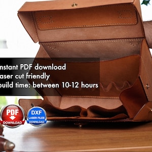 May include: An open brown leather box with a hinged lid, revealing a compartment with multiple slots. The box is laser cut friendly and has an estimated build time of 10-12 hours. The image includes text: "instant PDF download", "laser cut friendly", "build time: between 10-12 hours", "PDF DOWNLOAD", "DXF LASER FILES DOWNLOAD".