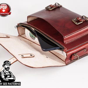 May include: A handcrafted, burgundy leather messenger bag with a top flap and a zippered compartment. The bag features brass-colored buckles and stitching. A smartphone is visible inside the zippered compartment. The image also includes a "PDF DOWNLOAD" graphic and the text "TONY SEE PATTERNS".