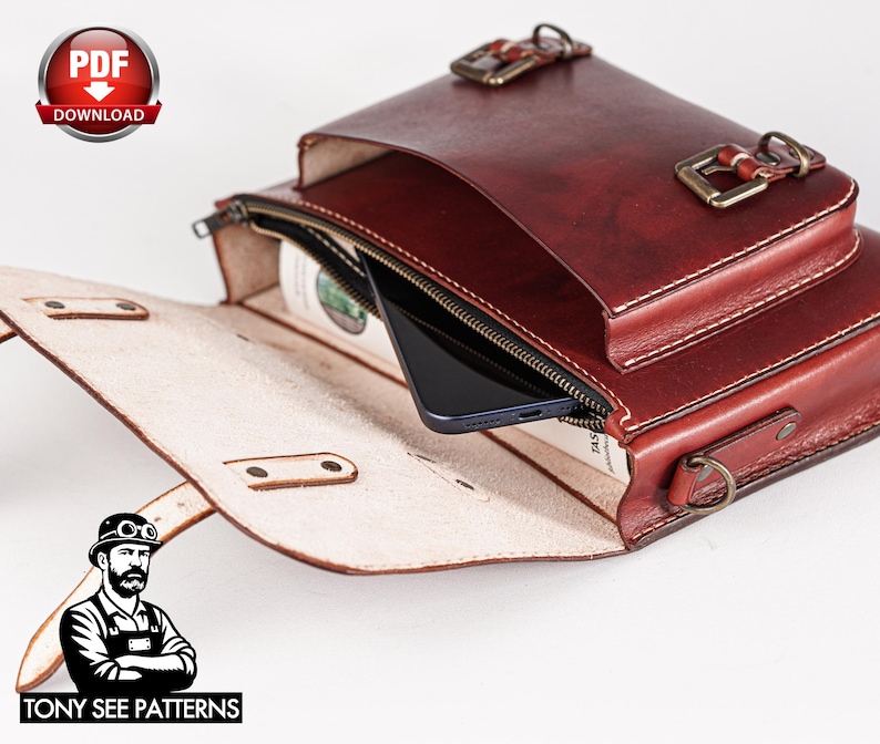 May include: A handcrafted, burgundy leather messenger bag with a top flap and a zippered compartment. The bag features brass-colored buckles and stitching. A smartphone is visible inside the zippered compartment. The image also includes a "PDF DOWNLOAD" graphic and the text "TONY SEE PATTERNS".